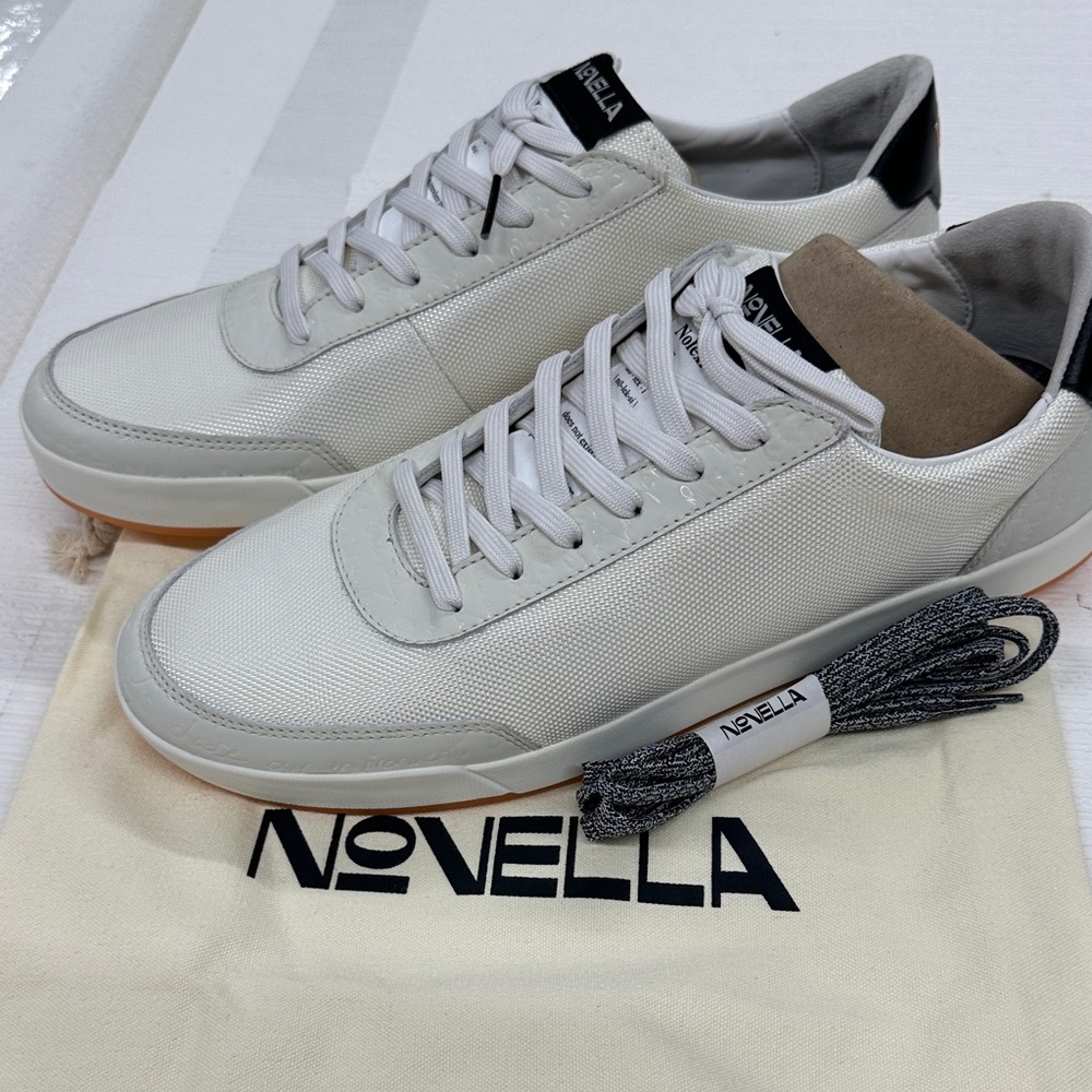 Novella limited edition silver leather sneakers men’s 13/ women’s 14.5 NWOT